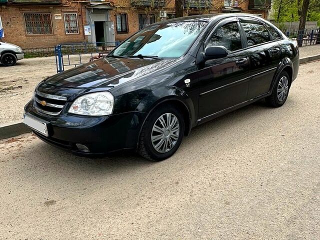 Черный Шевроле Лачетти, объемом двигателя 1.6 л и пробегом 280 тыс. км за 4000 $, фото 1 на Automoto.ua