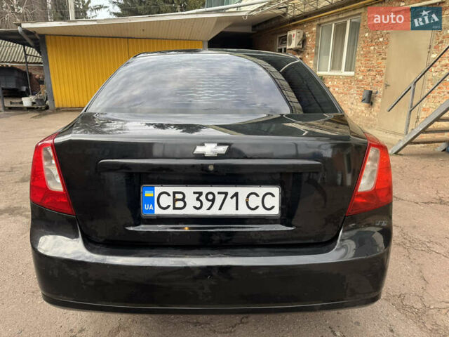 Черный Шевроле Лачетти, объемом двигателя 1.8 л и пробегом 220 тыс. км за 2999 $, фото 5 на Automoto.ua