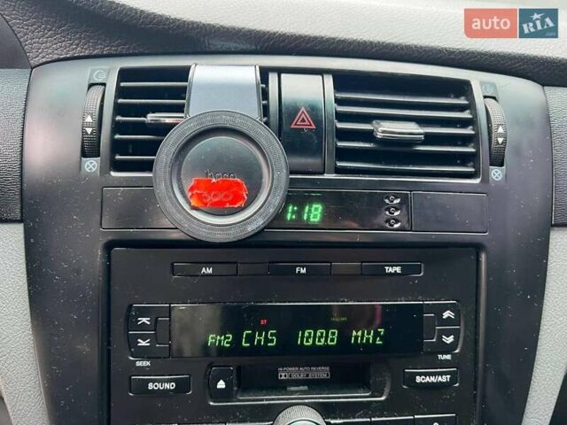 Черный Шевроле Лачетти, объемом двигателя 1.6 л и пробегом 247 тыс. км за 3890 $, фото 25 на Automoto.ua