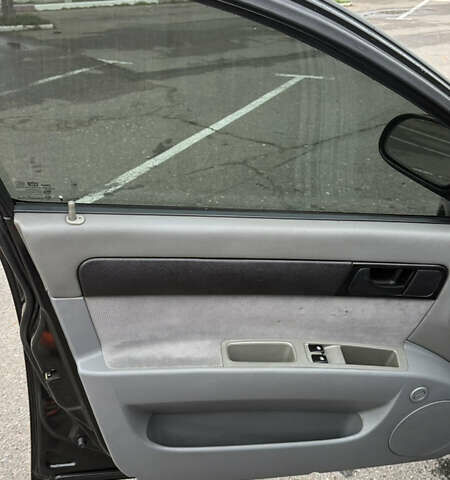 Чорний Шевроле Лачетті, об'ємом двигуна 1.6 л та пробігом 166 тис. км за 4900 $, фото 9 на Automoto.ua