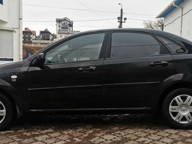 Черный Шевроле Лачетти, объемом двигателя 1.6 л и пробегом 185 тыс. км за 5300 $, фото 19 на Automoto.ua