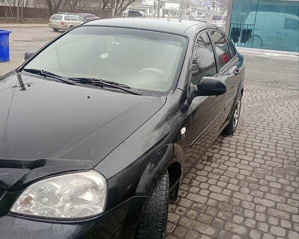Черный Шевроле Лачетти, объемом двигателя 1.6 л и пробегом 285 тыс. км за 2900 $, фото 6 на Automoto.ua