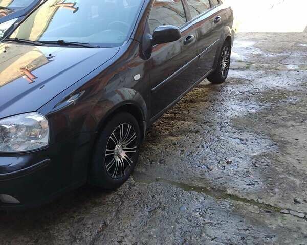 Чорний Шевроле Лачетті, об'ємом двигуна 1.8 л та пробігом 150 тис. км за 4450 $, фото 3 на Automoto.ua