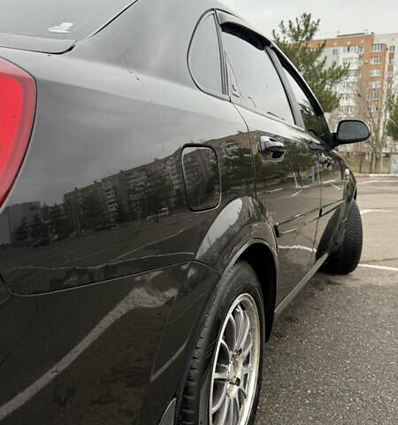 Чорний Шевроле Лачетті, об'ємом двигуна 1.6 л та пробігом 166 тис. км за 4900 $, фото 5 на Automoto.ua