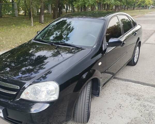 Черный Шевроле Лачетти, объемом двигателя 1.8 л и пробегом 265 тыс. км за 4600 $, фото 8 на Automoto.ua