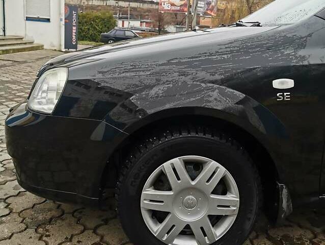 Чорний Шевроле Лачетті, об'ємом двигуна 1.6 л та пробігом 185 тис. км за 5300 $, фото 21 на Automoto.ua