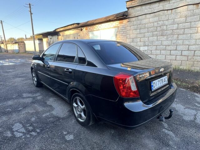 Черный Шевроле Лачетти, объемом двигателя 1.8 л и пробегом 300 тыс. км за 3950 $, фото 4 на Automoto.ua