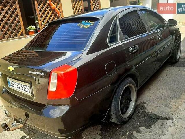 Черный Шевроле Лачетти, объемом двигателя 1.8 л и пробегом 150 тыс. км за 4800 $, фото 1 на Automoto.ua