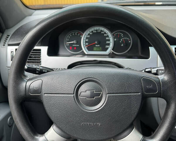 Черный Шевроле Лачетти, объемом двигателя 1.8 л и пробегом 220 тыс. км за 2999 $, фото 11 на Automoto.ua