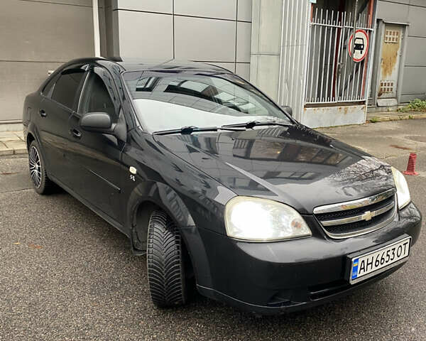 Черный Шевроле Лачетти, объемом двигателя 1.6 л и пробегом 154 тыс. км за 4800 $, фото 1 на Automoto.ua