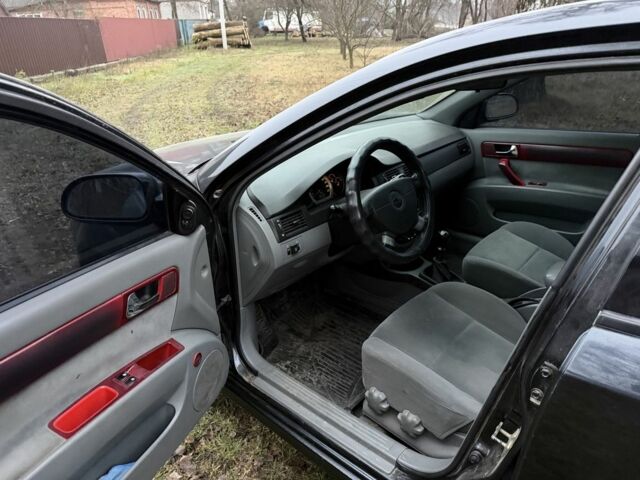 Черный Шевроле Лачетти, объемом двигателя 1.8 л и пробегом 213 тыс. км за 3750 $, фото 11 на Automoto.ua