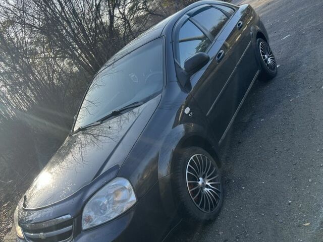 Черный Шевроле Лачетти, объемом двигателя 1.6 л и пробегом 150 тыс. км за 5300 $, фото 2 на Automoto.ua