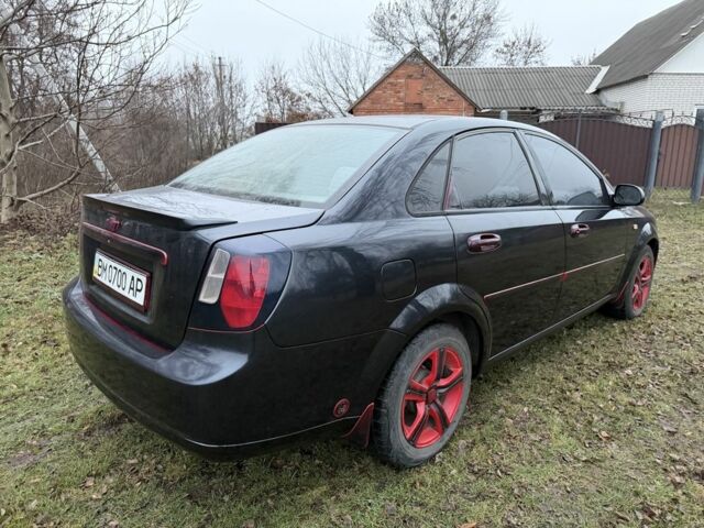 Черный Шевроле Лачетти, объемом двигателя 1.8 л и пробегом 213 тыс. км за 3750 $, фото 12 на Automoto.ua