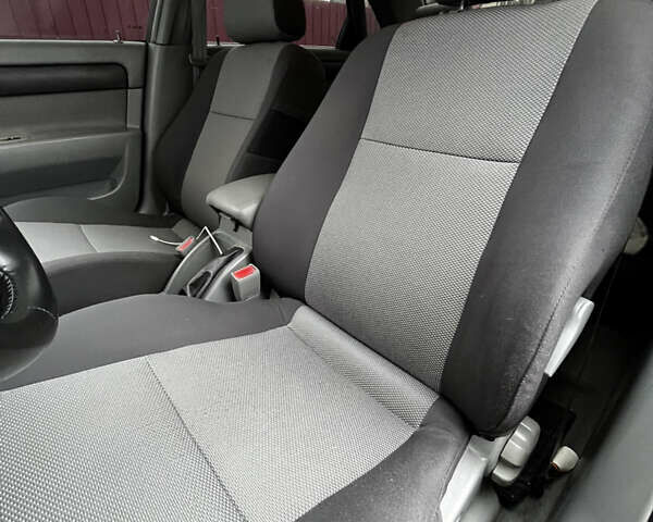 Черный Шевроле Лачетти, объемом двигателя 1.8 л и пробегом 176 тыс. км за 4550 $, фото 4 на Automoto.ua