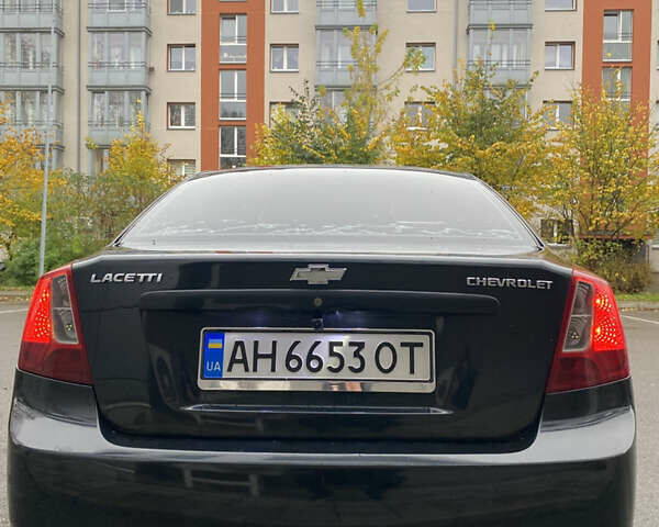 Черный Шевроле Лачетти, объемом двигателя 1.6 л и пробегом 154 тыс. км за 4800 $, фото 5 на Automoto.ua