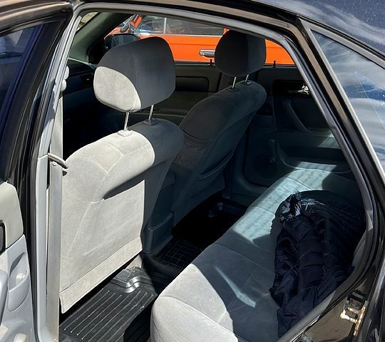 Чорний Шевроле Лачетті, об'ємом двигуна 1.8 л та пробігом 224 тис. км за 4300 $, фото 4 на Automoto.ua