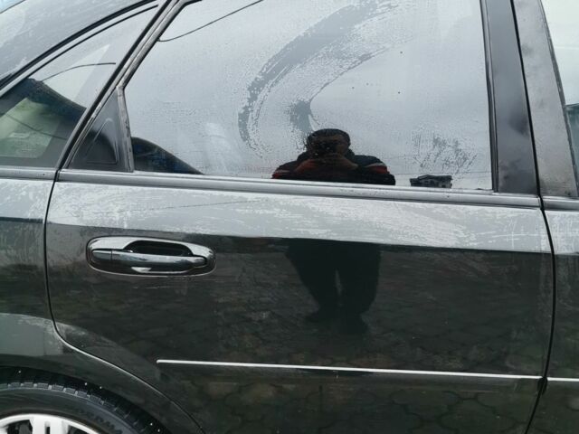 Черный Шевроле Лачетти, объемом двигателя 1.6 л и пробегом 185 тыс. км за 5300 $, фото 10 на Automoto.ua