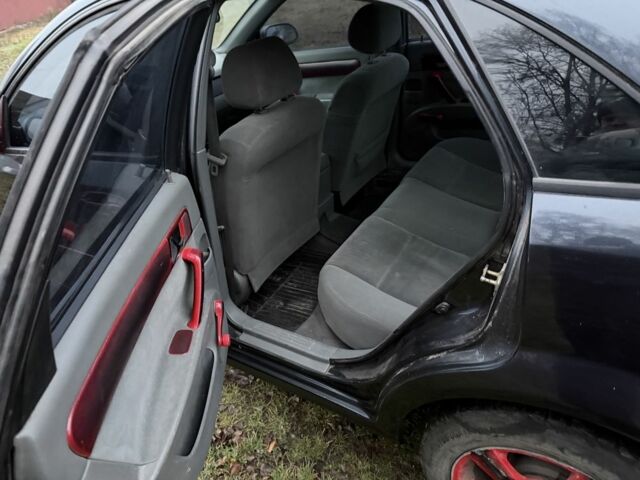 Черный Шевроле Лачетти, объемом двигателя 1.8 л и пробегом 213 тыс. км за 3750 $, фото 8 на Automoto.ua