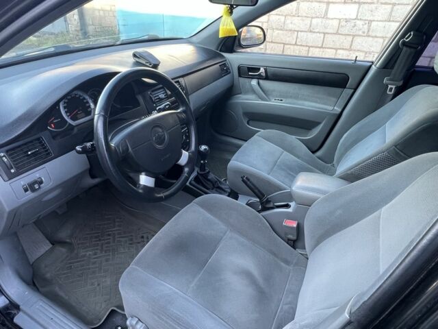 Черный Шевроле Лачетти, объемом двигателя 1.8 л и пробегом 300 тыс. км за 3950 $, фото 7 на Automoto.ua