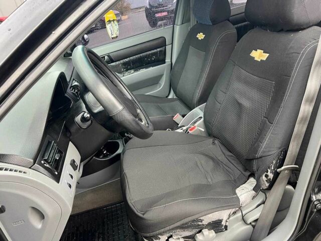 Чорний Шевроле Лачетті, об'ємом двигуна 1.6 л та пробігом 247 тис. км за 3890 $, фото 17 на Automoto.ua