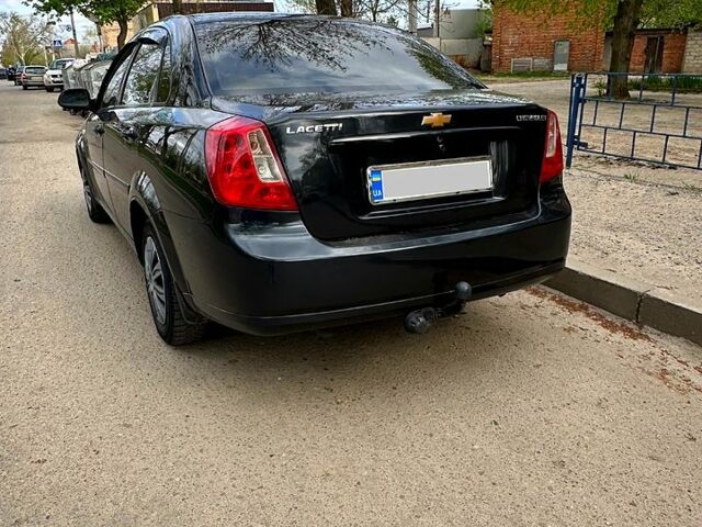 Черный Шевроле Лачетти, объемом двигателя 1.6 л и пробегом 280 тыс. км за 4000 $, фото 2 на Automoto.ua