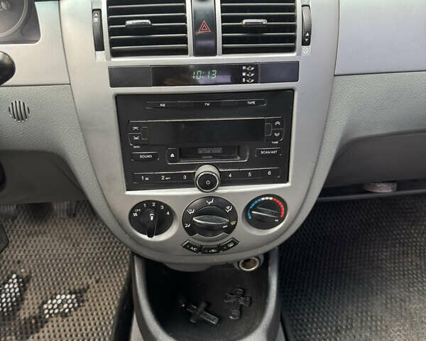 Черный Шевроле Лачетти, объемом двигателя 1.8 л и пробегом 220 тыс. км за 2999 $, фото 13 на Automoto.ua