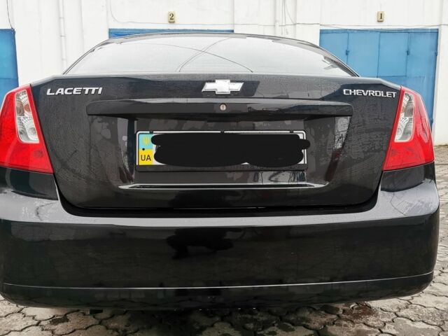 Черный Шевроле Лачетти, объемом двигателя 1.6 л и пробегом 185 тыс. км за 5300 $, фото 18 на Automoto.ua