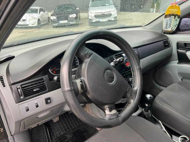 Чорний Шевроле Лачетті, об'ємом двигуна 1.6 л та пробігом 247 тис. км за 3890 $, фото 16 на Automoto.ua