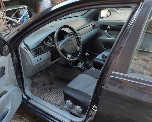 Чорний Шевроле Лачетті, об'ємом двигуна 1.8 л та пробігом 150 тис. км за 4450 $, фото 4 на Automoto.ua