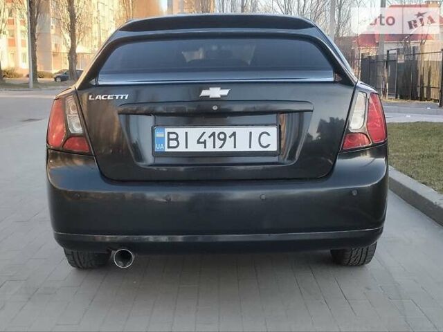 Черный Шевроле Лачетти, объемом двигателя 1.8 л и пробегом 237 тыс. км за 3850 $, фото 1 на Automoto.ua