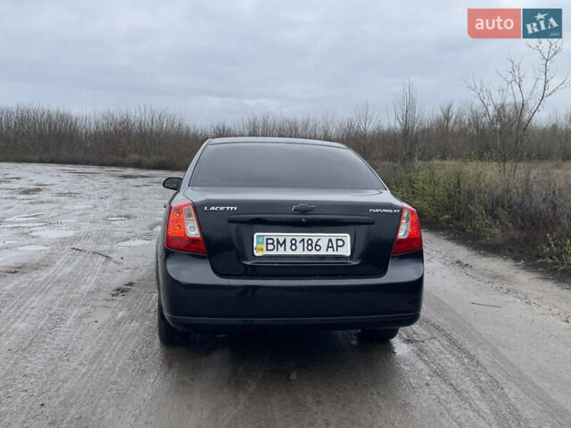 Черный Шевроле Лачетти, объемом двигателя 1.6 л и пробегом 222 тыс. км за 4400 $, фото 4 на Automoto.ua