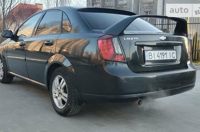 Черный Шевроле Лачетти, объемом двигателя 1.8 л и пробегом 237 тыс. км за 3850 $, фото 6 на Automoto.ua