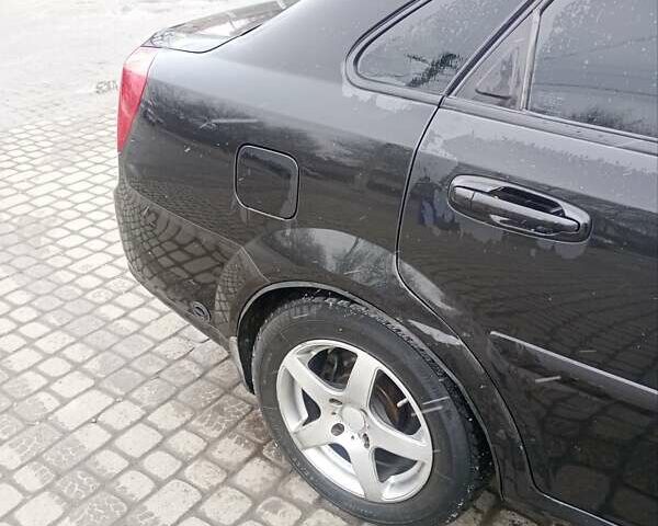 Черный Шевроле Лачетти, объемом двигателя 1.6 л и пробегом 285 тыс. км за 2900 $, фото 10 на Automoto.ua