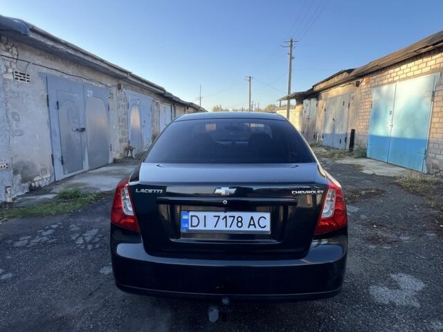 Черный Шевроле Лачетти, объемом двигателя 1.8 л и пробегом 300 тыс. км за 3950 $, фото 5 на Automoto.ua