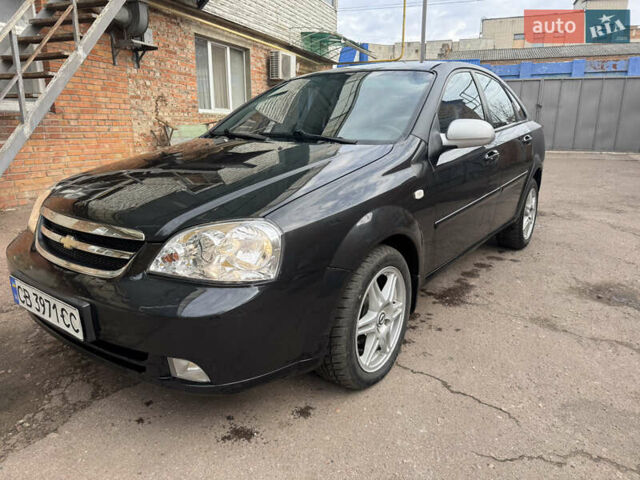 Черный Шевроле Лачетти, объемом двигателя 1.8 л и пробегом 220 тыс. км за 2999 $, фото 2 на Automoto.ua
