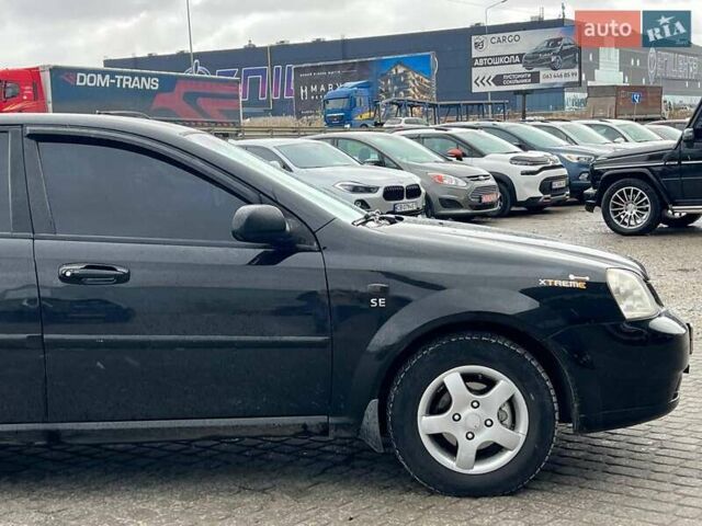 Черный Шевроле Лачетти, объемом двигателя 1.6 л и пробегом 247 тыс. км за 3890 $, фото 11 на Automoto.ua