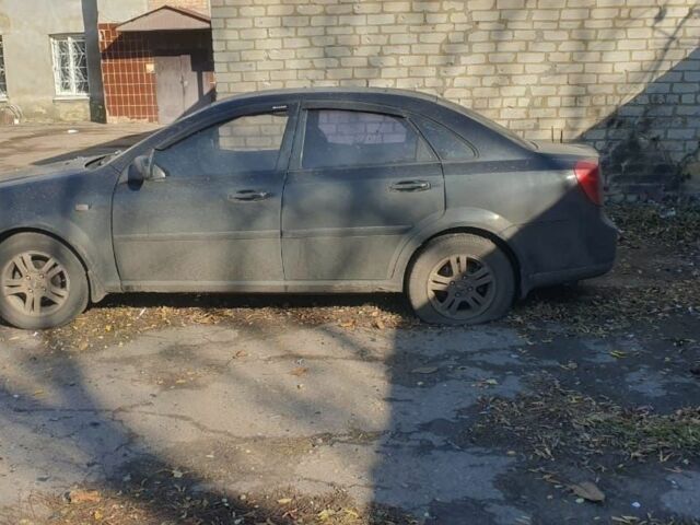 Черный Шевроле Лачетти, объемом двигателя 1.8 л и пробегом 280 тыс. км за 1000 $, фото 1 на Automoto.ua