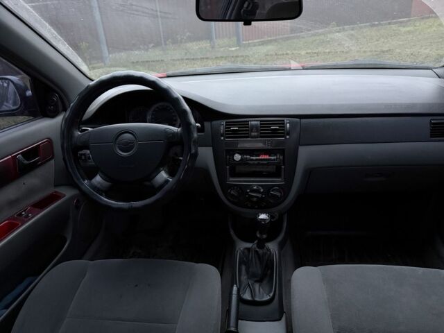 Черный Шевроле Лачетти, объемом двигателя 1.8 л и пробегом 213 тыс. км за 3750 $, фото 7 на Automoto.ua