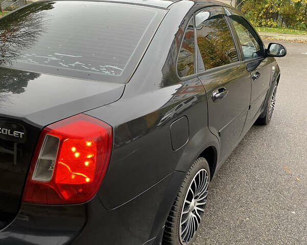 Черный Шевроле Лачетти, объемом двигателя 1.6 л и пробегом 154 тыс. км за 4800 $, фото 7 на Automoto.ua