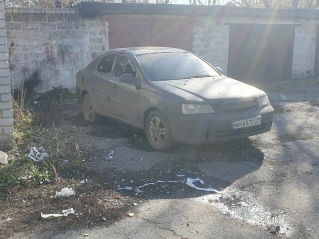 Черный Шевроле Лачетти, объемом двигателя 1.8 л и пробегом 280 тыс. км за 1000 $, фото 2 на Automoto.ua