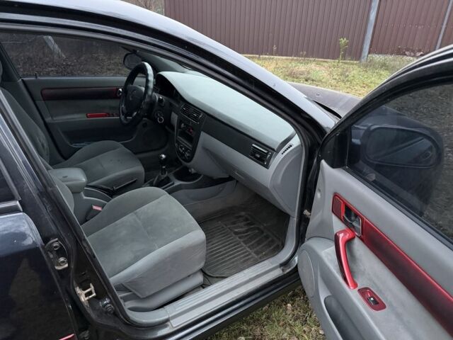 Черный Шевроле Лачетти, объемом двигателя 1.8 л и пробегом 213 тыс. км за 3750 $, фото 5 на Automoto.ua