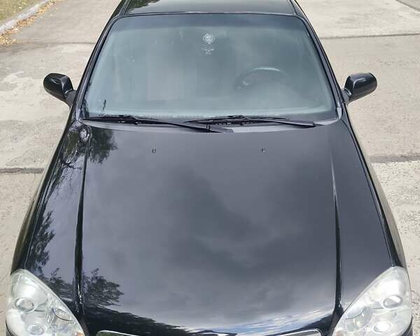 Черный Шевроле Лачетти, объемом двигателя 1.8 л и пробегом 265 тыс. км за 4600 $, фото 2 на Automoto.ua