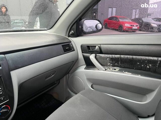 Чорний Шевроле Лачетті, об'ємом двигуна 1.6 л та пробігом 247 тис. км за 3890 $, фото 28 на Automoto.ua