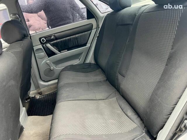 Чорний Шевроле Лачетті, об'ємом двигуна 1.6 л та пробігом 247 тис. км за 3890 $, фото 30 на Automoto.ua