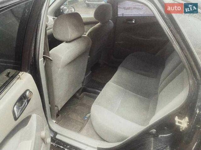 Черный Шевроле Лачетти, объемом двигателя 1.8 л и пробегом 280 тыс. км за 2750 $, фото 1 на Automoto.ua