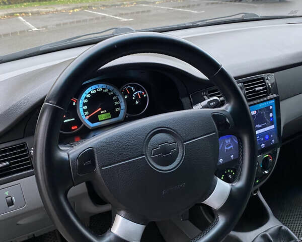 Черный Шевроле Лачетти, объемом двигателя 1.6 л и пробегом 154 тыс. км за 4800 $, фото 4 на Automoto.ua