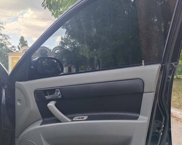 Черный Шевроле Лачетти, объемом двигателя 1.8 л и пробегом 265 тыс. км за 4600 $, фото 19 на Automoto.ua