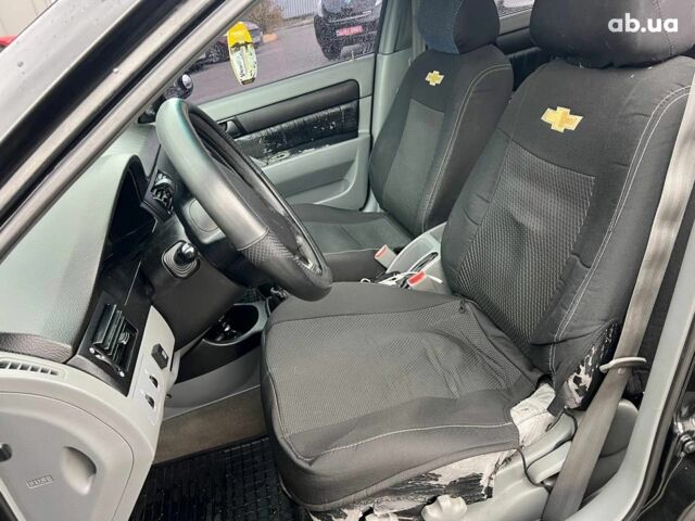 Чорний Шевроле Лачетті, об'ємом двигуна 1.6 л та пробігом 247 тис. км за 3890 $, фото 17 на Automoto.ua