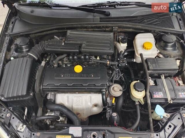 Черный Шевроле Лачетти, объемом двигателя 1.8 л и пробегом 265 тыс. км за 4600 $, фото 46 на Automoto.ua