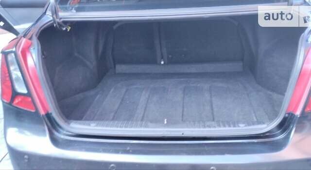 Черный Шевроле Лачетти, объемом двигателя 1.8 л и пробегом 237 тыс. км за 3850 $, фото 13 на Automoto.ua